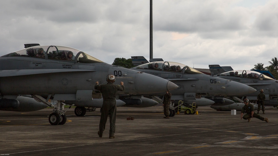 U.S. Marine Corps F/A-18D Hornets with Marine All-Weather Fighter Attack Squadron 225 prepare for takeoff during exercise Cope West 17 at Sam Ratulangi International Airport, Indonesia, Nov. 10, 2016. This fighter-focused, bilateral exercise between the U.S. Marine Corps and Indonesian Air Force is designed to enhance the readiness of combined interoperability between the two nations. 