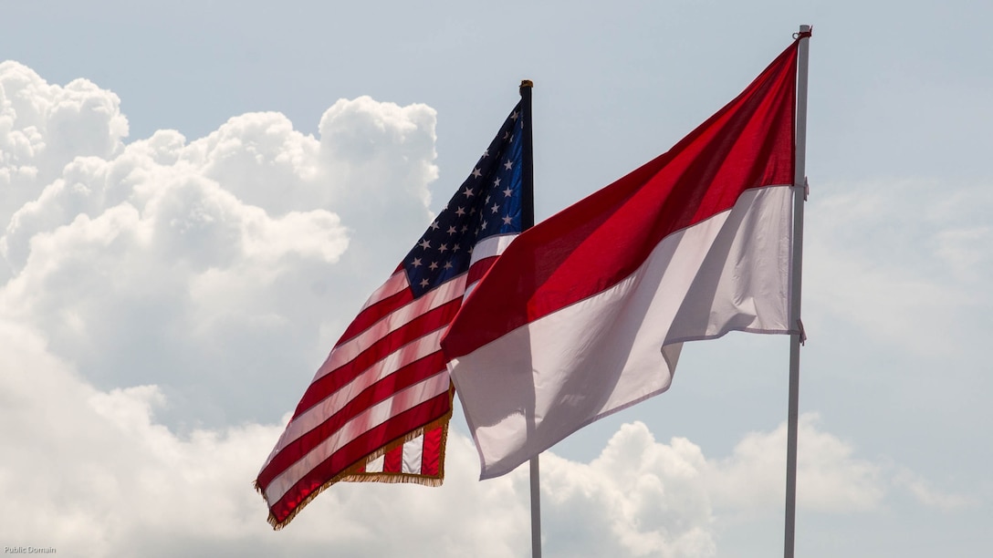 The U.S. and Indonesian flags fly during a closing ceremony for exercise Cope West 17 at Sam Ratulangi International Airport, Indonesia, Nov. 11, 2016. This fighter-focused, bilateral exercise between the U.S. Marine Corps and Indonesian Air Force is designed to enhance the readiness of combined interoperability between the two nations. Cope West 17 is the first fighter-focused exercise in Indonesia in 19 years involving the U.S. Military and the Indonesian Air Force. 