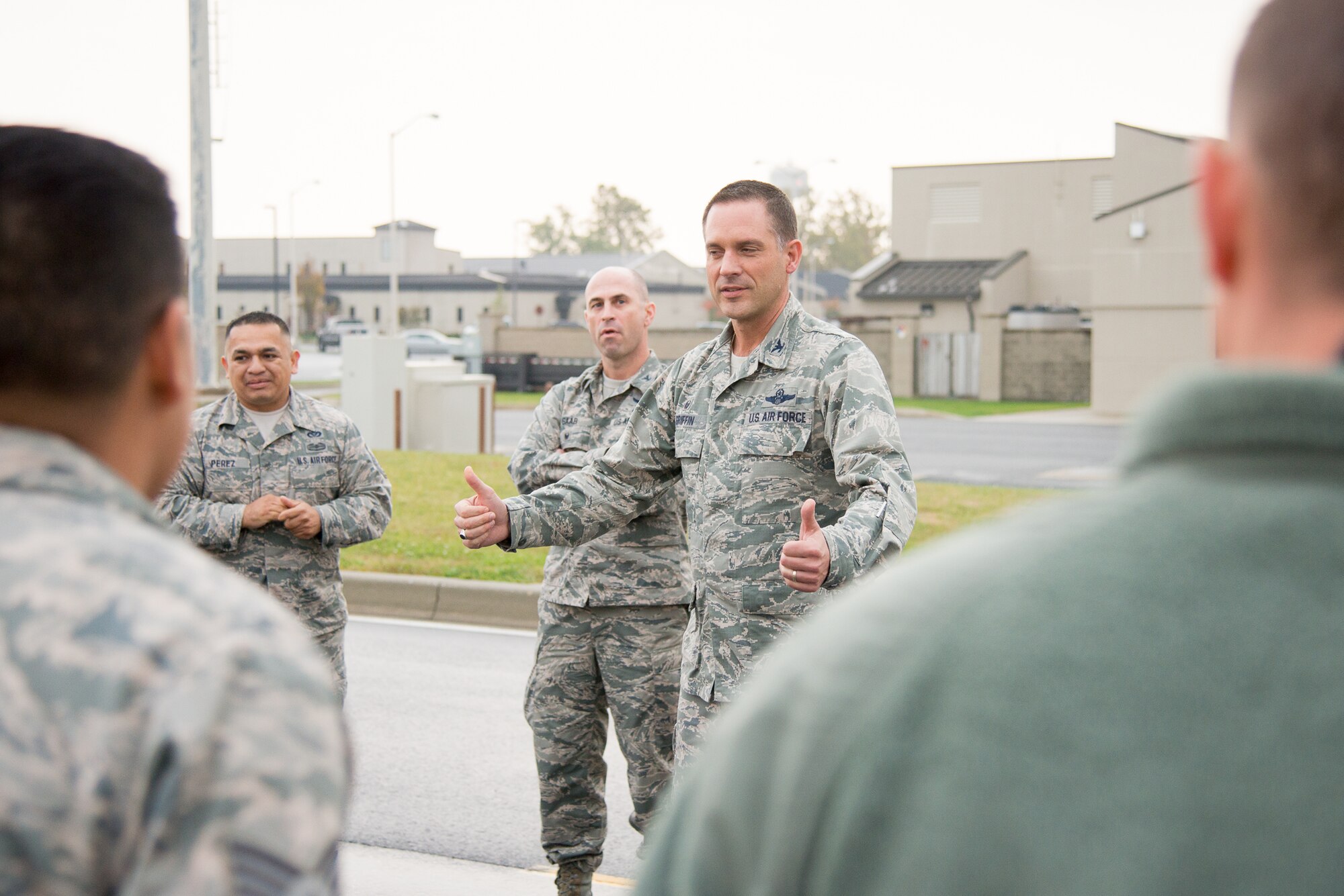 Col. Ethan Griffin, 436th Airlift Wing commander, speaks to 436th Civil Engineer Squadron Airmen prior to the snow parade Nov. 9, 2016, on Dover Air Force Base, Del. This was Griffin’s first snow parade since taking command in August 2016. (U.S. Air Force photo by Mauricio Campino)
