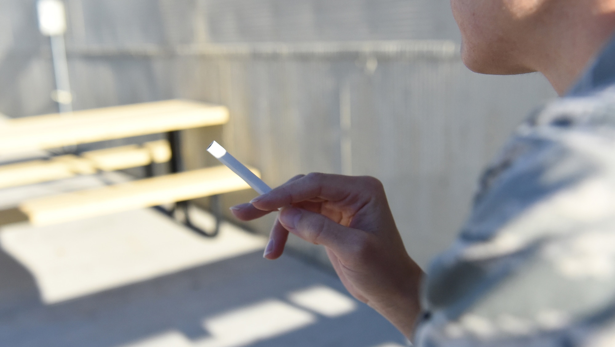 An Airman contemplates lighting up a cigarette as a coping mechanism against stress.  The Malmstrom Health Clinic has a tobacco cessation program that offers alternate methods to help cope with stress as well as reducing the urge in using tobacco.  
