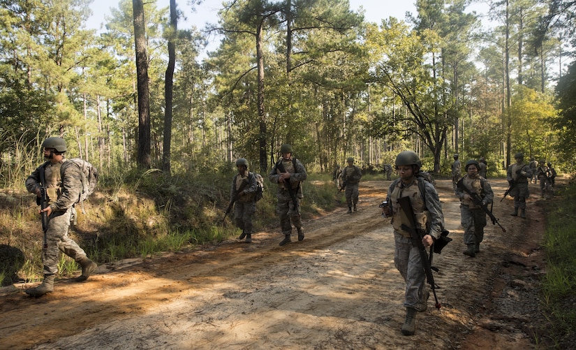 Joint Base Charleston Airmen execute a foot patrol during the first JB Charleston Combat Skills Training course here, Sept. 28, 2016. The four day course was instructed by S.C. Army National Guard members who trained participants on basic tactical combat skills such as weapons training, combat life saver skills, counter improvised explosive device tactics, communications and land navigation.