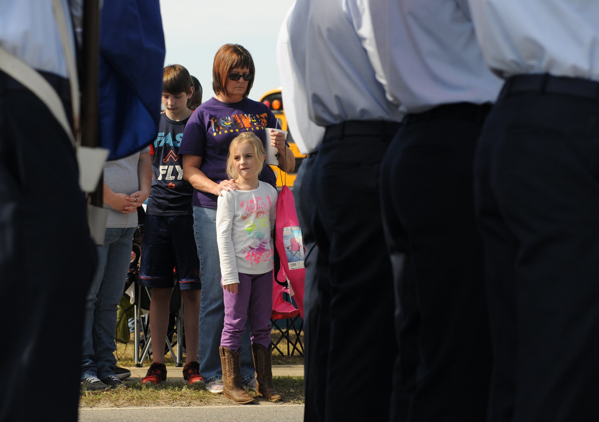 Attendees participate in a prayer before the 16th Annual Gulf Coast Veterans Day Parade Nov. 12, 2016, in D’Iberville, Miss. More than 5,000 Mississippi and Louisiana citizens watched the parade honoring Gulf Coast veterans. Keesler Honor Guard members, base leadership and more than 215 81st Training Group Airmen with the 50 State Flag Team and Drum and Bugle Corps also came out to celebrate the holiday. (U.S. Air Force photo by Senior Airman Holly Mansfield)