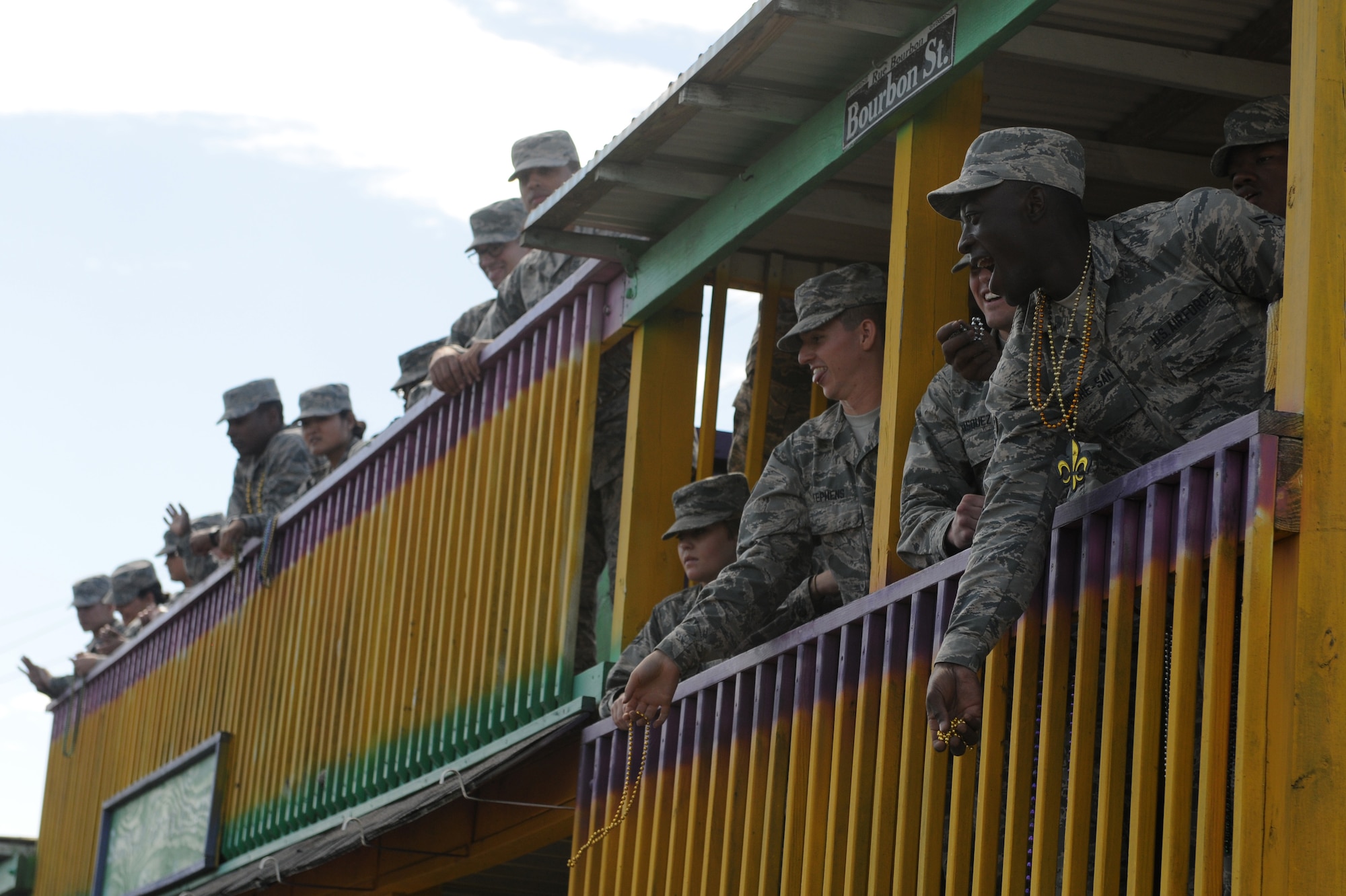 Students of the 81st TRG ride on a float in the 16th Annual Gulf Coast Veterans Day Parade Nov. 12, 2016, in D’Iberville, Miss. More than 5,000 Mississippi and Louisiana citizens watch the parade honoring Gulf Coast veterans. Keesler Honor Guard members, base leadership and more than 215 81st Training Group Airmen with the 50 State Flag Team and Drum and Bugle Corps also came out to celebrate the holiday. (U.S. Air Force photo by Senior Airman Holly Mansfield)