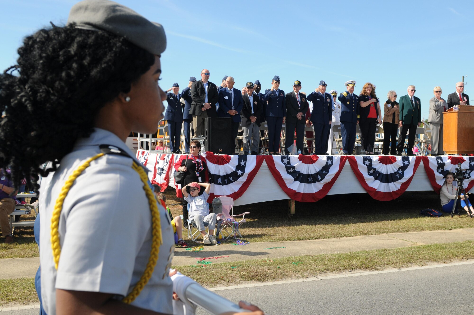 Gulf Coast military and civilian leadership show their appreciation to Junior ROTC members as they pass by at the 16th Annual Gulf Coast Veterans Day Parade Nov. 12, 2016, in D’Iberville, Miss. More than 5,000 Mississippi and Louisiana citizens watch the parade honoring Gulf Coast veterans. Keesler Honor Guard members, base leadership and more than 215 81st Training Group Airmen with the 50 State Flag Team and Drum and Bugle Corps also came out to celebrate the holiday. (U.S. Air Force photo by Senior Airman Holly Mansfield)