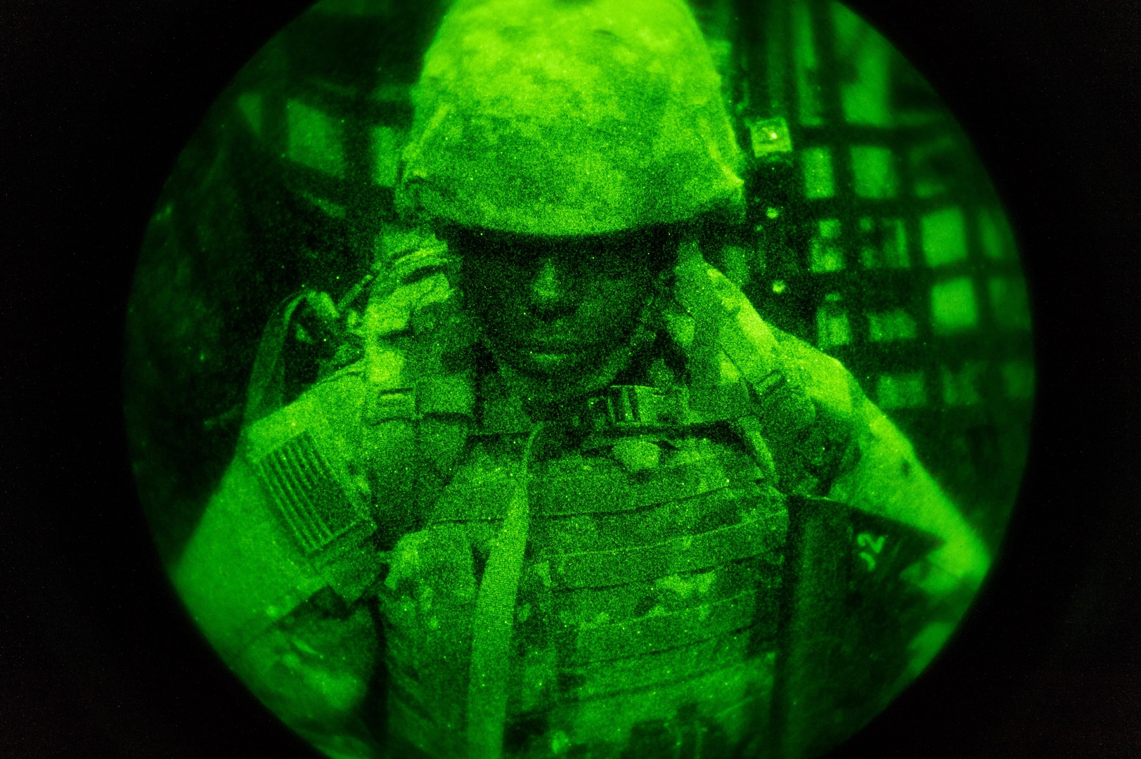 A security forces Airman readies before landing at at Qayyarah West Airfield, Iraq, in support of Combined Joint Task Force - Operation Inherent Resolve, Nov. 12, 2016. Security forces squadrons actively support the Mosul offensive by providing site security at Coalition forces staging areas. (U.S. Air Force photo by Senior Airman Jordan Castelan)