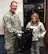 Staff Sgt. Victor Blazevic, 339th Recruiting Squadron enlisted accessions recruiter, presents an Air Force backpack to Megan Darby, a student at Porter County Career Center in Valporaiso, Ind., Nov. 9. Darby won the backpack in a drawing after Blazevic spoke to her automotive technology class about the opportunities and benefits of joining the Air Force.