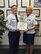 Senior Master Sgt. Brian Dixon, 331st Recruiting Squadron production superintendent, presents Staff Sgt. Angela Williams, 331st RCS enlisted accessions recruiter, with her recruiter certification, Oct. 17.