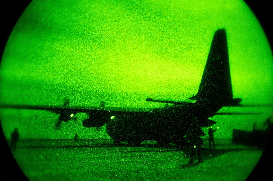 A 746th Expeditionary Airlift Squadron C-130 is guarded by members of a security forces team and 821st Contingency Response Group Airmen during blackout conditions while being unloaded by aerial porters at Qayyarah West Airfield, Iraq, in support of Combined Joint Task Force - Operation Inherent Resolve, Nov. 12, 2016. The 821st CRG is highly-specialized in training and rapidly deploying personnel to quickly open airfields and establish, expand, sustain and coordinate air operations in austere, bare-base conditions. (U.S. Air Force photo by Senior Airman Jordan Castelan)

