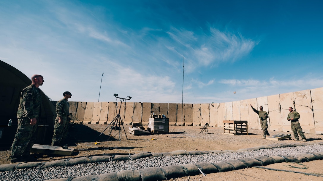 Airmen with the 821st Contingency Response Group play corn hole with makeshift boards and bags during downtime at Qayyarah West Airfield, Iraq, Nov. 13, 2016. The airfield at Qayyarah West was recaptured from Da’esh by Iraqi forces in July 2016, and has been refurbished by Coalition engineers to allow the re-commencement of air operations. Qayyarah Airfield is now a vital logistical hub, opening an air corridor in support of the battle to liberate Mosul as well as operations throughout northern Iraq. (U.S. Air Force photo by Senior Airman Jordan Castelan)