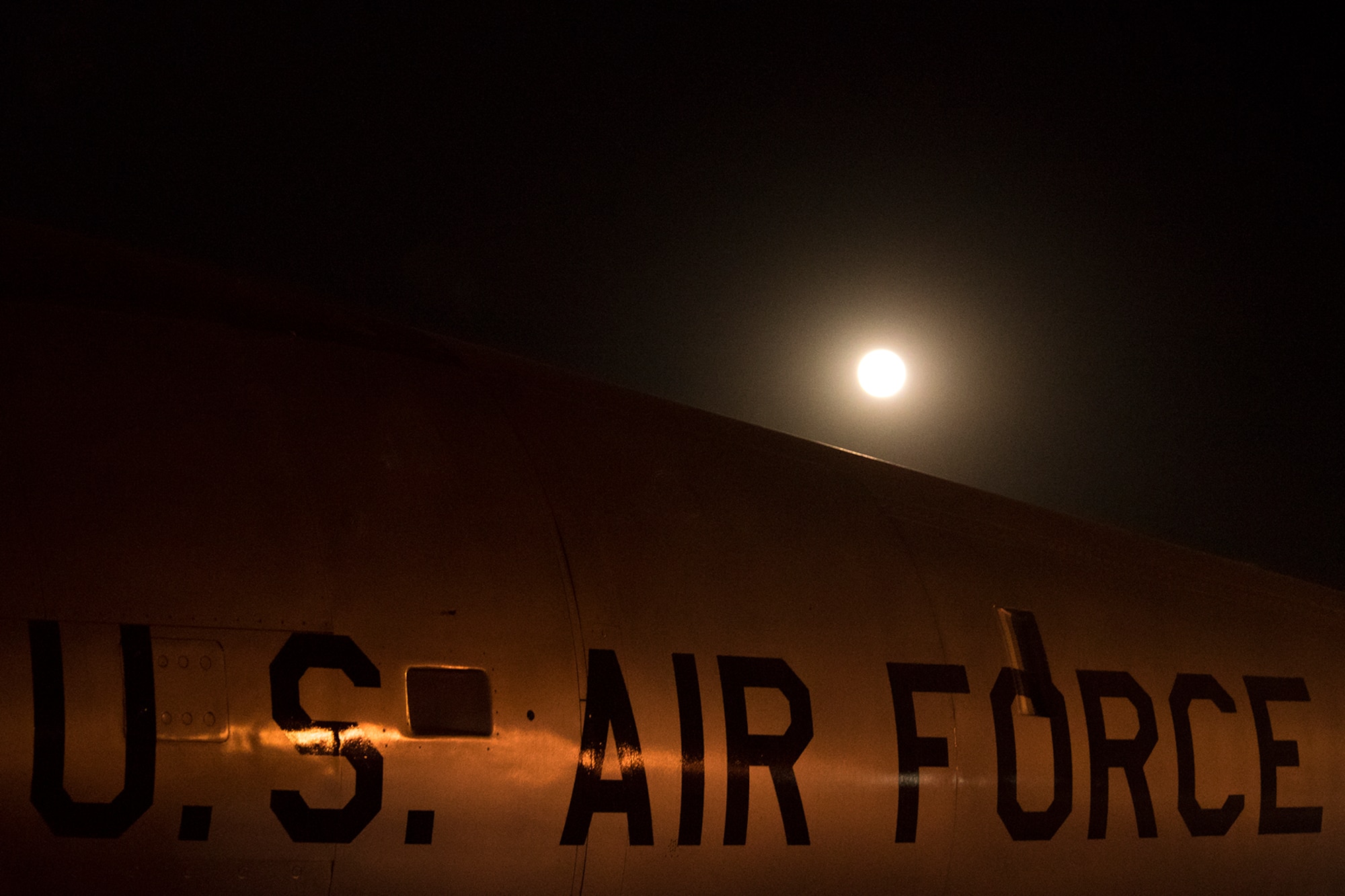 PETERSON AIR FORCE BASE, Colo. – A supermoon rises over an aircraft display at the Peterson Air & Space Museum on Peterson Air Force Base, Colo., Nov. 14, 2016. A supermoon is 14 percent bigger and 30 percent brighter than a normal full moon. (U.S. Air Force photo by Airman 1st Class Dennis Hoffman)