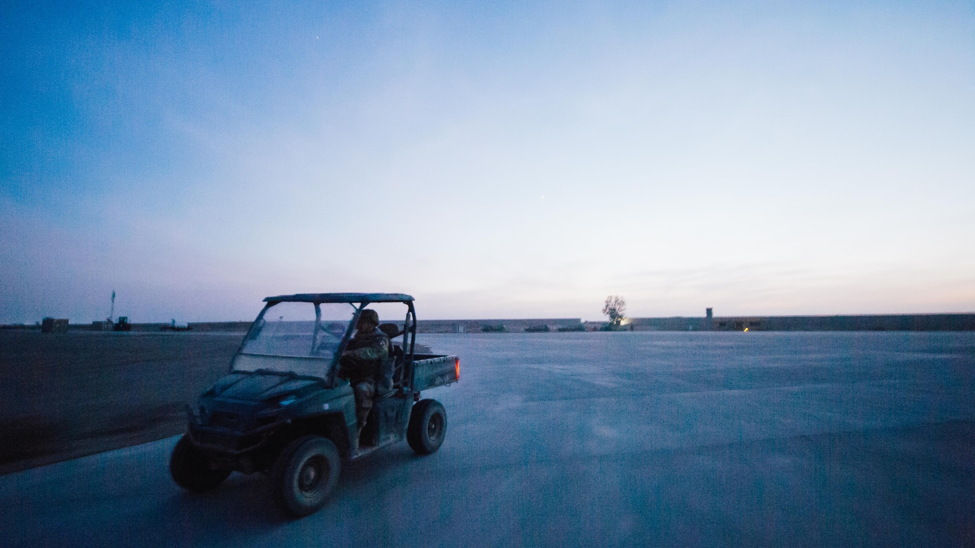 U.S. Air Force Staff Sgt. Steven Ramos, 821st Contingency Response Group airfield manager, drives a utility vehicle to a job site at Qayyarah West Airfield, Iraq, in support of Combined Joint Task Force - Operation Inherent Resolve, Nov. 14, 2016. The 821st CRG is highly-specialized in training and rapidly deploying personnel to quickly open airfields and establish, expand, sustain and coordinate air operations in austere, bare-base conditions. (U.S. Air Force photo by Senior Airman Jordan Castelan)