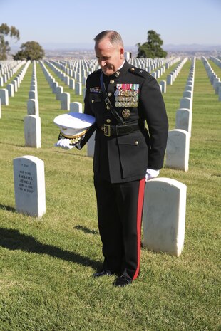 Brigadier General William M. Jurney, commanding general, Marine Corps Recruit Depot San Diego/Western Recruiting Region, stands for a moment of silence at the grave of Leland D. Crawford, the ninth sergeant major of the Marine Corps, Nov. 10. Jurney took part in a wreath laying ceremony to honor Crawford and celebrate the Marine Corps’ 241st birthday, which is Nov. 10, 1775.