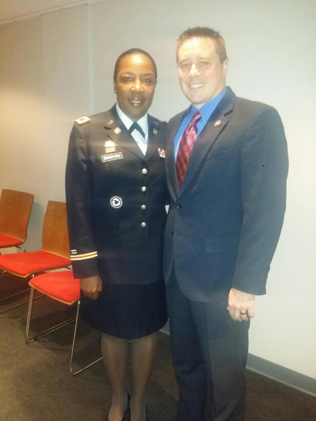 Colonel Bradford is all smiles as she takes a photo with Missouri Senator Ryan Silvey.