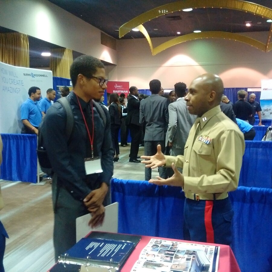 HOUSTON, Texas -- Marines from Recruiting Station Houston and the Officer Selection Team Houston meet with students at the National Society of Black Engineers Fall Regional Conference in Houston, Texas, Nov. 11. Students from across NSBE’s Region 5 attended the conference and received information about what it takes to become a Marine Corps Officer. The University of Houston’s NSBE chapter has more notoriety this year, after receiving multiple awards at the national conference, former NSBE President Patrick Guide II is set to graduate from Officer Candidates School and commission as a Second Lieutenant in the Marine Corps,  Nov. 19.
