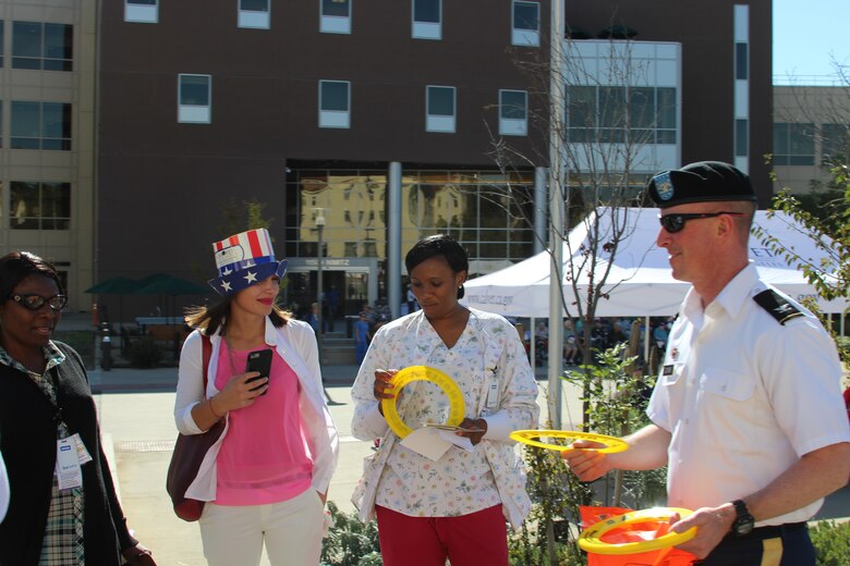 On Nov.11, over 10 U.S. Army Corps of Engineers Los Angeles District staff employees and family members marched in “America’s Parade” on the VA West Los Angeles Medical Center campus.  The parade was coordinated through the County of Los Angeles, City of Los Angeles and the American Legion, partnered with the United War Veterans Council, organizers of the New York Veterans Day Parade.   Prior to the start of the parade, District Commander, Col. Kirk Gibbs, attended the Wreath Laying Ceremony at the National Ceremony attended by California State Secretary of Veteran Affairs Vito Imbasciani and LA County Board Supervisor Hilda Solis.  The ceremony and parade honors America's Veterans for their patriotism, love of country and willingness to serve and sacrifice for the common good.  
