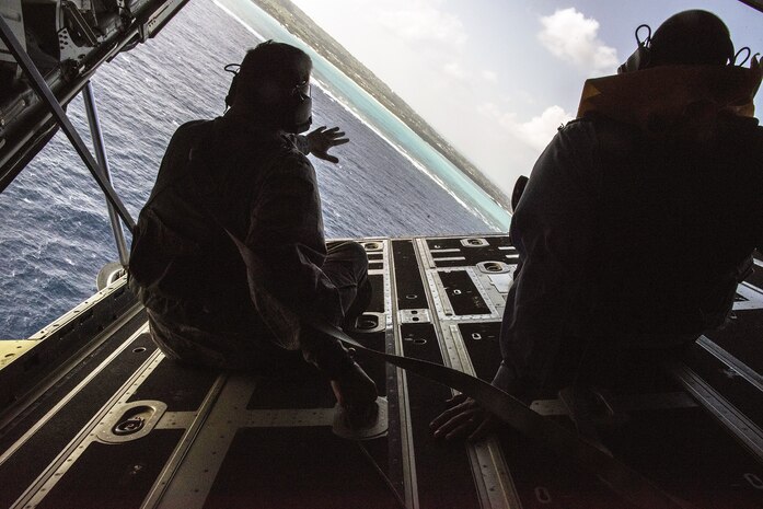 U.S. Air Force Lt. Gen. Brad Webb, commander of Air Force Special Operations Command, looks out the back of an MC-130J Commando II during an island tour of Okinawa, Japan, Nov. 7, 2016. Webb flew on the MC-130J as a part of his visit to the 353rd Special Operations Group.