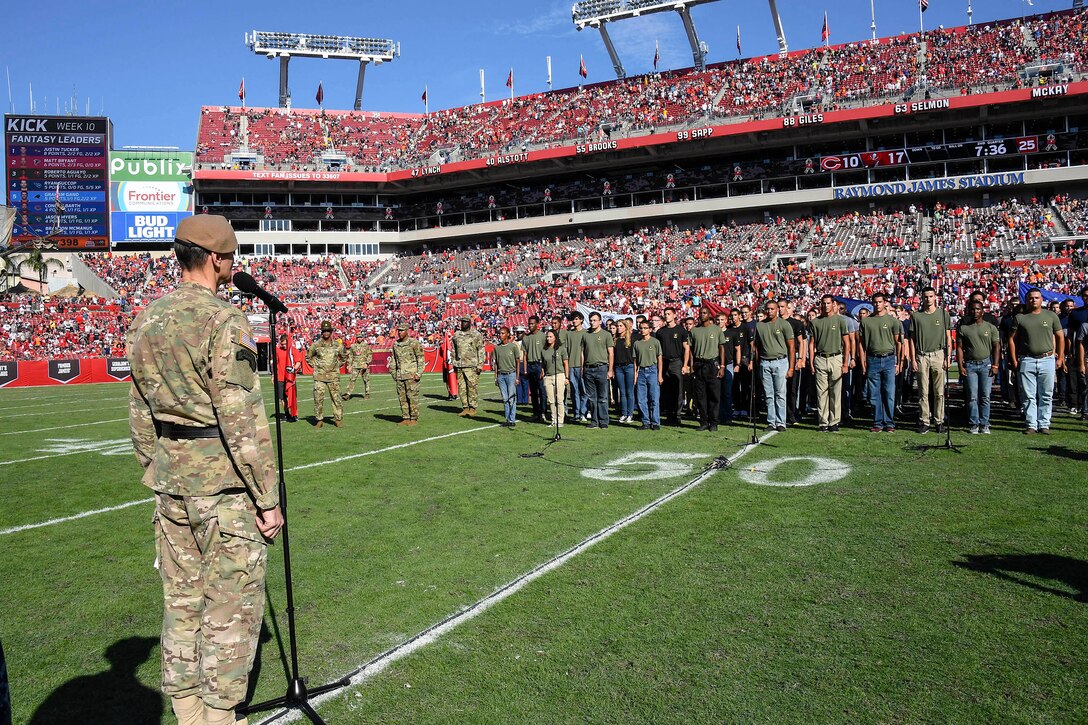 TAMPA, (Nov, 13, 2016) During the game’s halftime intermission, the Tampa Bay Buccaneers hosted a Military Enlistment Ceremony for 180 inductees of all service branches, conducted by General Joseph Votel – Commander, U.S. Central Command.
