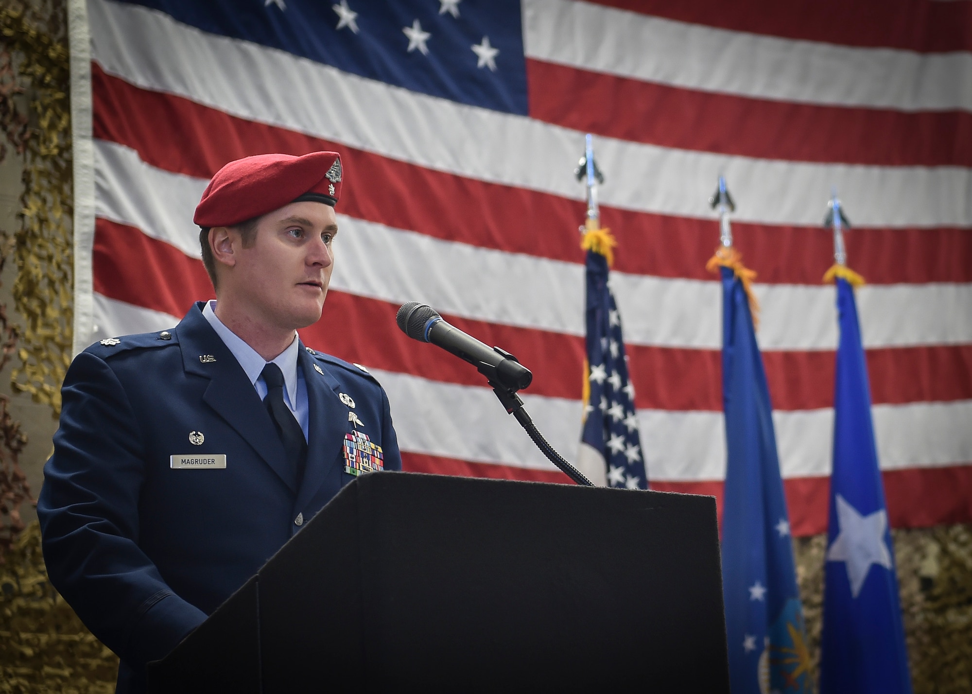 The commander of the 22nd Special Tactics Squadron, Lt. Col. Daniel Macgruder, speaks during a Silver Star Medal presentation ceremony to Staff Sgt. Keaton Thiem, a combat contoller, at Joint Base Lewis-McChord, Wash., Nov. 16, 2016. Thiem used air power to ensure the safety of his 100-plus man SOF element during a 14-hour firefight with no regard for his own personal safety, while deployed with U.S. Army Special Operations Forces in Afghanistan.(U.S. Air Force photo by Senior Airman Ryan Conroy)