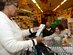 U.S. Air Force Senior Airman Maya Pinhassian, 733rd Logistics Readiness Squadron inventory technician, and Tech. Sgt. Tatiana Butler, 733rd LRS assistant NCO in charge of inventory, provide a commissary customer with an Operation Warmheart pamphlet at Joint Base Langley-Eustis, Va., Nov. 15, 2016. Operation Warmheart receives a majority of their funds during the holiday season. (U.S. Air Force photo by Airman 1st Class Kaylee Dubois)