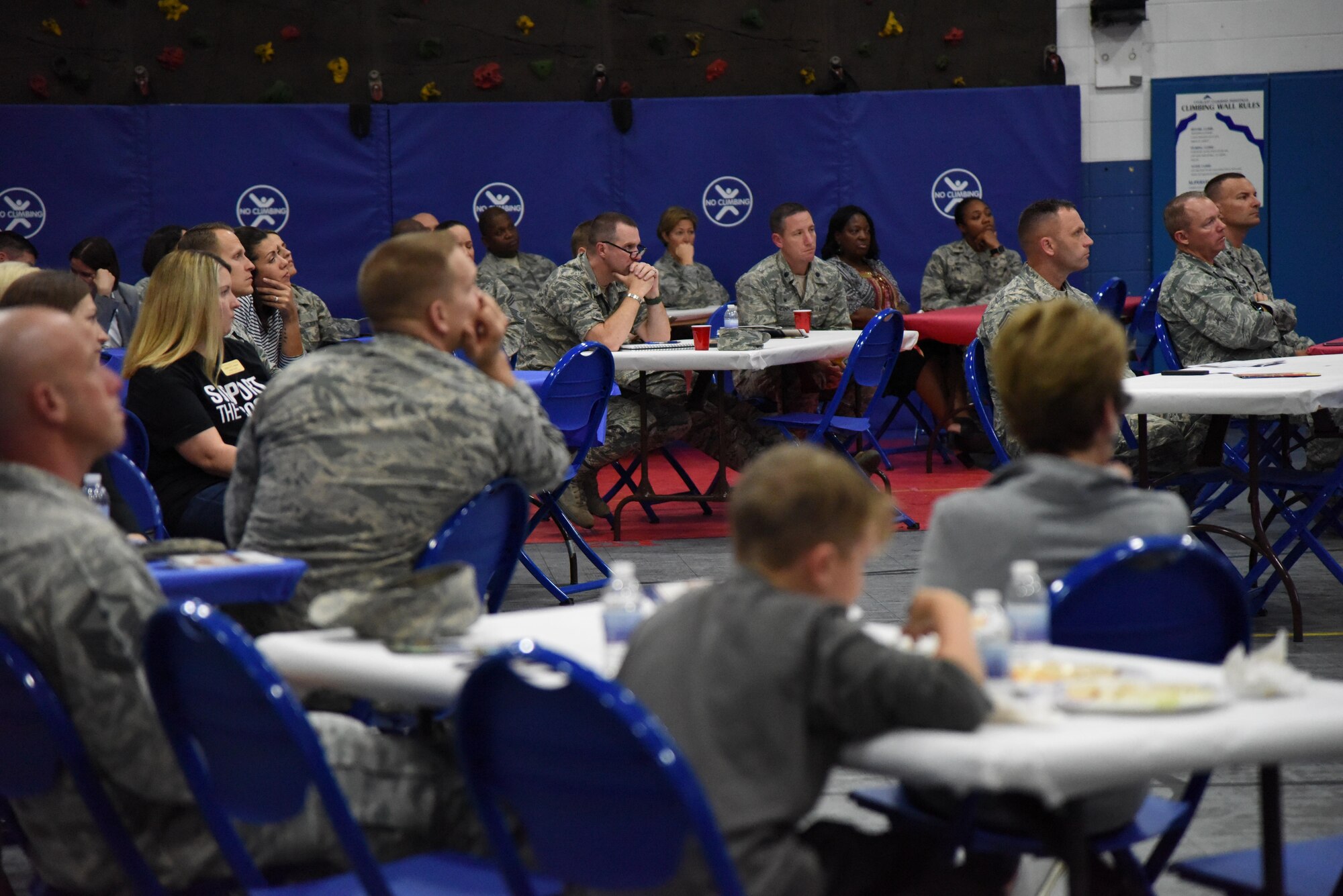 Keesler personnel attend a Town Hall meeting and Children’s Carnival event at the Youth Center Nov. 15, 2016, on Keesler Air Force Base, Miss. The event included a Q-and-A session with base leadership, updates from the Keesler Medical Center, family housing and 81st Force Support Squadron, as well as dinner and entertainment for children of those who attended. (U.S. Air Force photo by Kemberly Groue/Released)