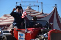 Lorenz Walker, Bossier City mayor, waves to the crowd at the State Fair of Louisiana in Shreveport, Nov. 13, 2016. Walker served 30 years as a pilot in the U.S. Air Force and retired in 1986. (U.S. Air Force photo/Airman 1st Class Stuart Bright)
