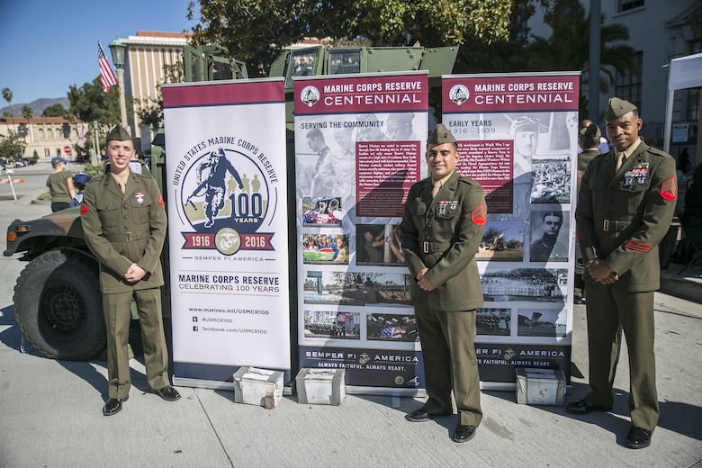 Marines with 2nd Battalion, 23rd Marine Regiment, 4th Marine Division, stand beside Marine Forces Reserve Centennial posters during a Veteran’s Day Centennial celebration, Nov. 11, 2016. The Marine Corps Reserve marked 100 years of service on Aug. 29, 2016.  For information on the history and heritage of the Marine Corps Reserve as well as current Marine stories and upcoming Centennial events, please visit www.marines.mil/usmcr100. 