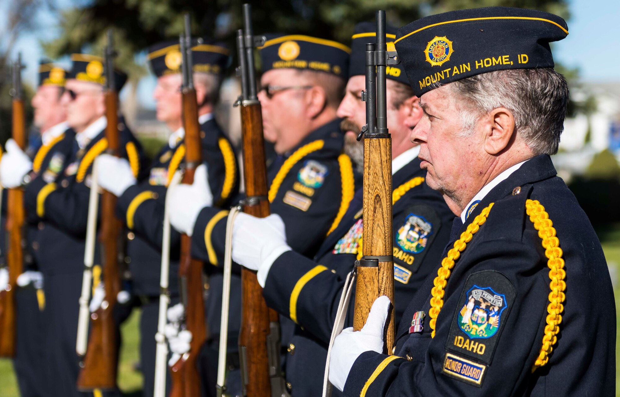 A young boy and a man salute a wreath they placed in honor of veterans at the annual Veterans day ceremony at Mountain Home, Idaho, Nov. 11, 2016. The event included an invocation, a rendition of the national anthem, a 21 gun salute and speeches by the Mayor of Mountain Home and the commander of the 366th Fighter Wing. (U.S. Air Force photo by Senior Airman Connor J. Marth/Released)
