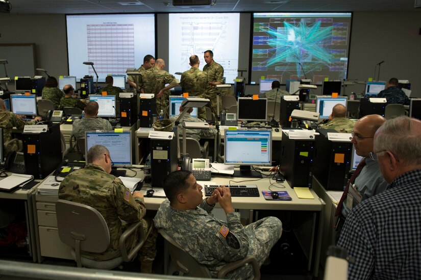 Participants in the joint, multinational exercise Cyber Guard 2016 work through a training scenario during the nine-day event in Suffolk, Va., June 16, 2016. Navy photo by Petty Officer 2nd Class Jesse A. Hyatt