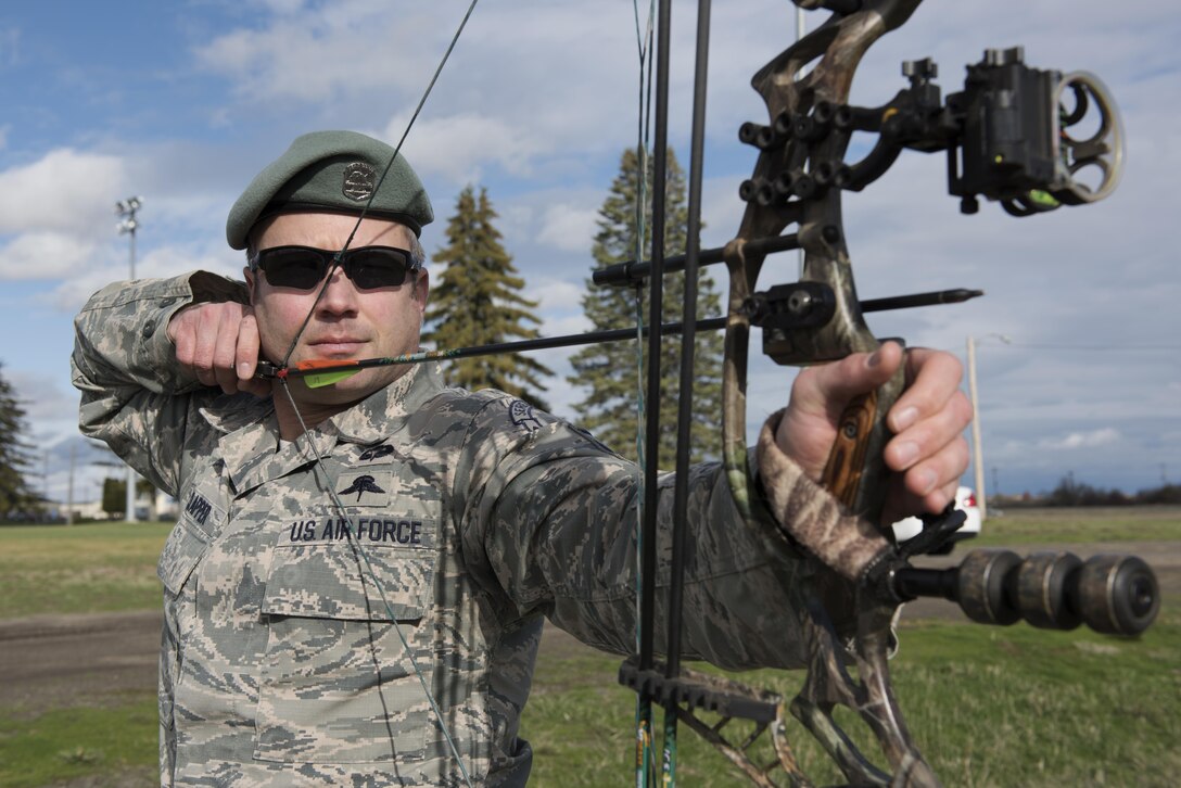 Master Sgt. Jason Clapper, 22nd Training Squadron resistance and advanced skills training superintendent, aims at his target Nov. 1, 2016 at Fairchild Air Force Base, Wash. Clapper has dedicated three years to develop the Survival Archery range. (U.S. Air Force photo/Senior Airman Nick J. Daniello)