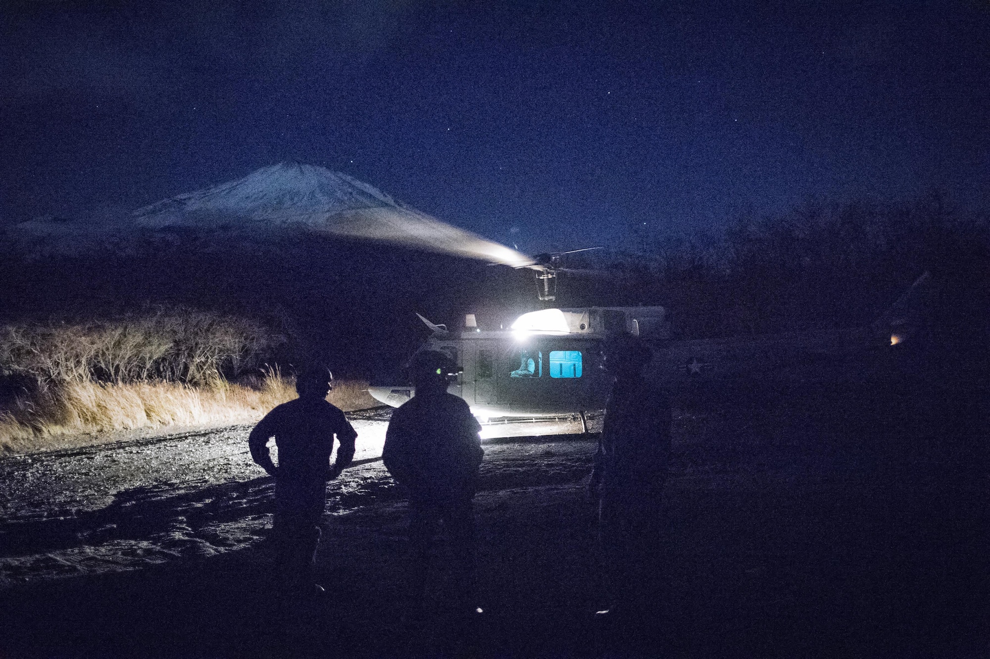 Airmen with the 459th Airlift Squadron and Japan Air Self-Defense Force Komatsu Air Rescue Squadron conduct a night vision goggles training at Combined Arms Training Center Camp Fuji, Nov. 9, 2016, during the Keen Sword 17.  The 459th AS and Komatsu Air RQS Airmen conducted a three-day NVGs and hoist familiarization training. (U.S. Air Force photo by Yasuo Osakabe/Released)  