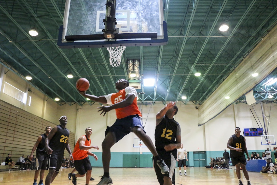 Soldiers compete in a basketball tournament during Marne Week at Fort Stewart, Ga., Nov. 15, 2016. The annual celebration of the 3rd Infantry Division, nicknamed the Marne Division, promotes esprit de corps with sports competitions, family events and a division ball. Army photo by Sgt. Joshua Laidacker
