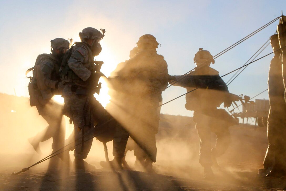 Soldiers carry a simulated casualty to a collection point during training at the National Training Center at Fort Irwin, Calif., Nov. 11, 2016. Army photo by Sgt. Nikayla Shodeen