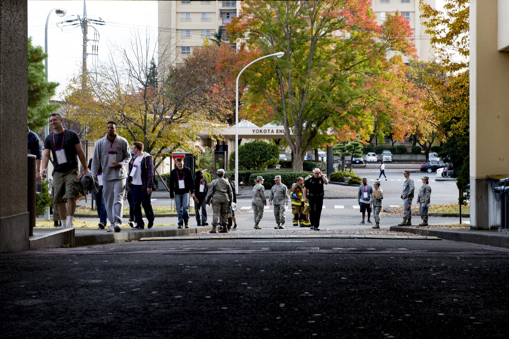 Simulated victims of a building collapse get into position during a natural disaster exercise on Nov. 15, 2016, at Yokota Air Base, Japan. The exercise simulated a large scale earthquake in the Tokyo metropolitan area and the effects it would have on base operations. (U.S. photo by Airman 1st Class Donald Hudson/Released)