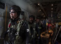 Japan Air Self-Defense Force pararescuemen prepare to jump out of an MC-130J Commando II during Exercise Keen Sword 17 Nov. 10, 2016, off the coast of Okinawa, Japan. Keen Sword is an annual exercise which strengthens interoperability between JASDF and U.S. combat rescue teams. (U.S. Air Force photo by Senior Airman Lynette M. Rolen/Released)