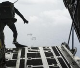 Japan Air Self-Defense Force pararescuemen jump out of an MC-130J Commando II during Exercise Keen Sword 17 Nov. 10, 2016, off the coast of Okinawa, Japan. Exercises like Keen Sword are a crucial demonstration of the strength of friendship between the U.S. and Japan. (U.S. Air Force photo by Senior Airman Lynette M. Rolen/Released)