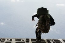 U.S. Air Force Maj. Edward Porter, 31st Rescue Squadron chief of standards and evaluations, jumps out of an MC-130J Commando II during Exercise Keen Sword 17 Nov. 10, 2016, off the coast of Okinawa, Japan. Exercises like Keen Sword demonstrate the strength of combined U.S.-Japan forces when the need arises to protect our allies. (U.S. Air Force photo by Senior Airman Lynette M. Rolen/Released)