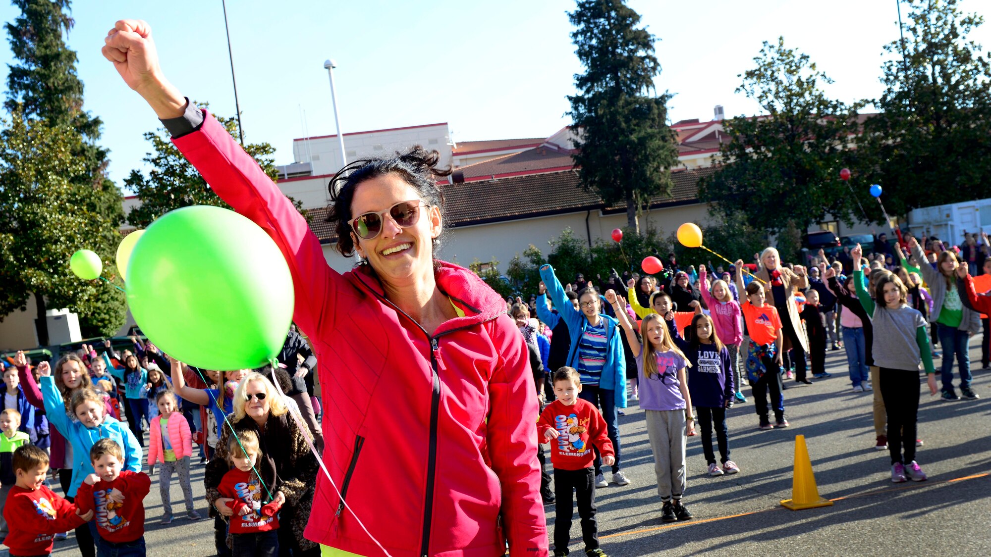 Julie Peressin, Aviano Elementary School physical education teacher, leads a choreographed dance during a World Kindness Day celebration at Aviano Air Base, Italy on Nov. 15, 2016. World Kindness Day was introduced in 1998 by the World Kindness Movement, an international movement with no political or religious affiliation. The movement’s mission is to inspire individuals towards greater kindness and to connect nations to create a kinder world. (U.S. Air Force photo by Senior Airman Areca T. Bell)