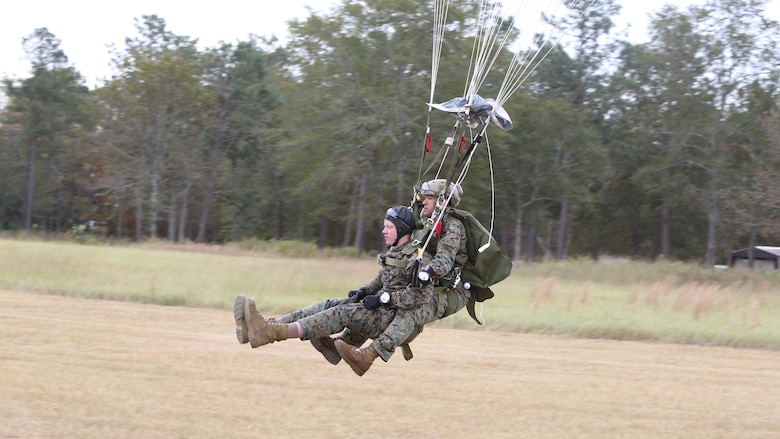 Marines with 2nd Reconnaissance Battalion land in a drop zone during a Tandem Offset Resupply Delivery System Course at Skydive Paraclete XP in Raeford, N.C., Nov. 1, 2016. This training teaches Marines how to jump with personnel or equipment in order to expand their mission capabilities. 
