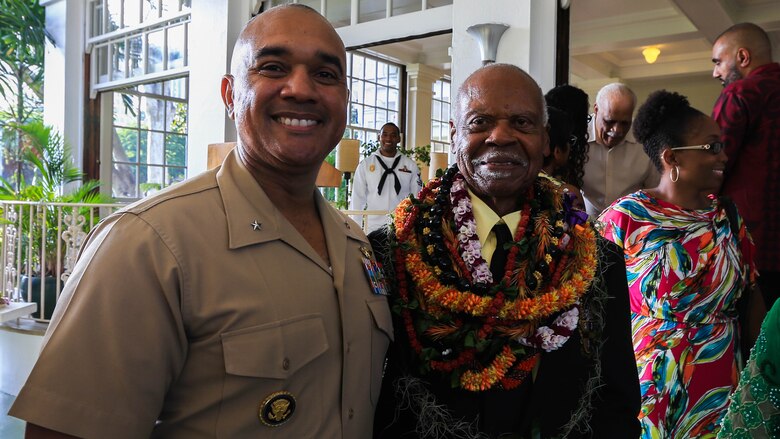 U.S. Marine Brig. Gen. Brian W. Cavanaugh, deputy commander of U.S. Marine Corps Forces, Pacific, and Dr. Ernest James Harris, Jr. stand together after a Congressional Gold Medal presentation in Honolulu Nov. 12, 2016. Harris was awarded his Congressional Gold Medal for his service as a Montford Point Marine. 