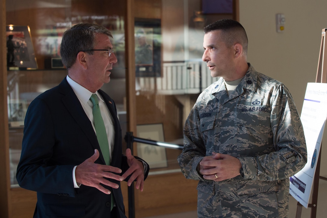 Defense Secretary Ash Carter speaks with Air Force Lt. Col. John Goodson.