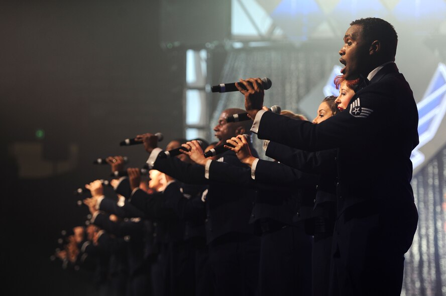 Tops in Blue members perform at the Minot Municipal Auditorium in Minot, N.D., Dec. 1, 2015. Tops in Blue’s mission is to serve as an expeditionary entertainment unit to provide equality from within Air Force resources for the Air Force family, with priority to Air Force personnel stationed worldwide at remote and deployed locations while simultaneously promoting community relations, supporting recruiting efforts and serving as ambassadors for the United States of America and the United States Air Force. (U.S. Air Force photo/Senior Airman Kristoffer Kaubisch)