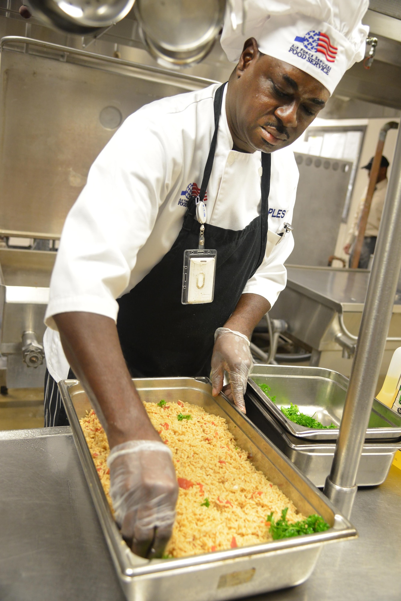 George Pless, 1st cook at the Wynn Dining Facility, prepares rice for a meal. The facility's Staff is competing in the 2017 Hennessey Award which recognizes the best dining facility in the Air Force. (U.S. Air Force photo by Ray Crayton)
