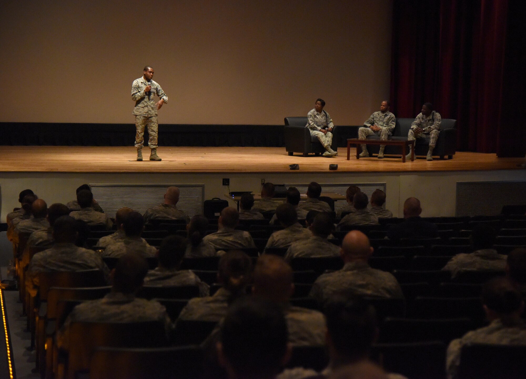 Airman 1st Class Rayan Paul, 81st Diagnostic and Therapeutics Squadron pharmacy technician, shares his story about overcoming an accident and being resilient during a Storytellers event at the Welch Theater Nov. 16, 2016, on Keesler Air Force Base, Miss. The event, consisting of three speakers, was one of several events held throughout Dragon Week, which focuses resiliency and teambuilding initiatives across the base. (U.S. Air Force photo by Kemberly Groue/Released)