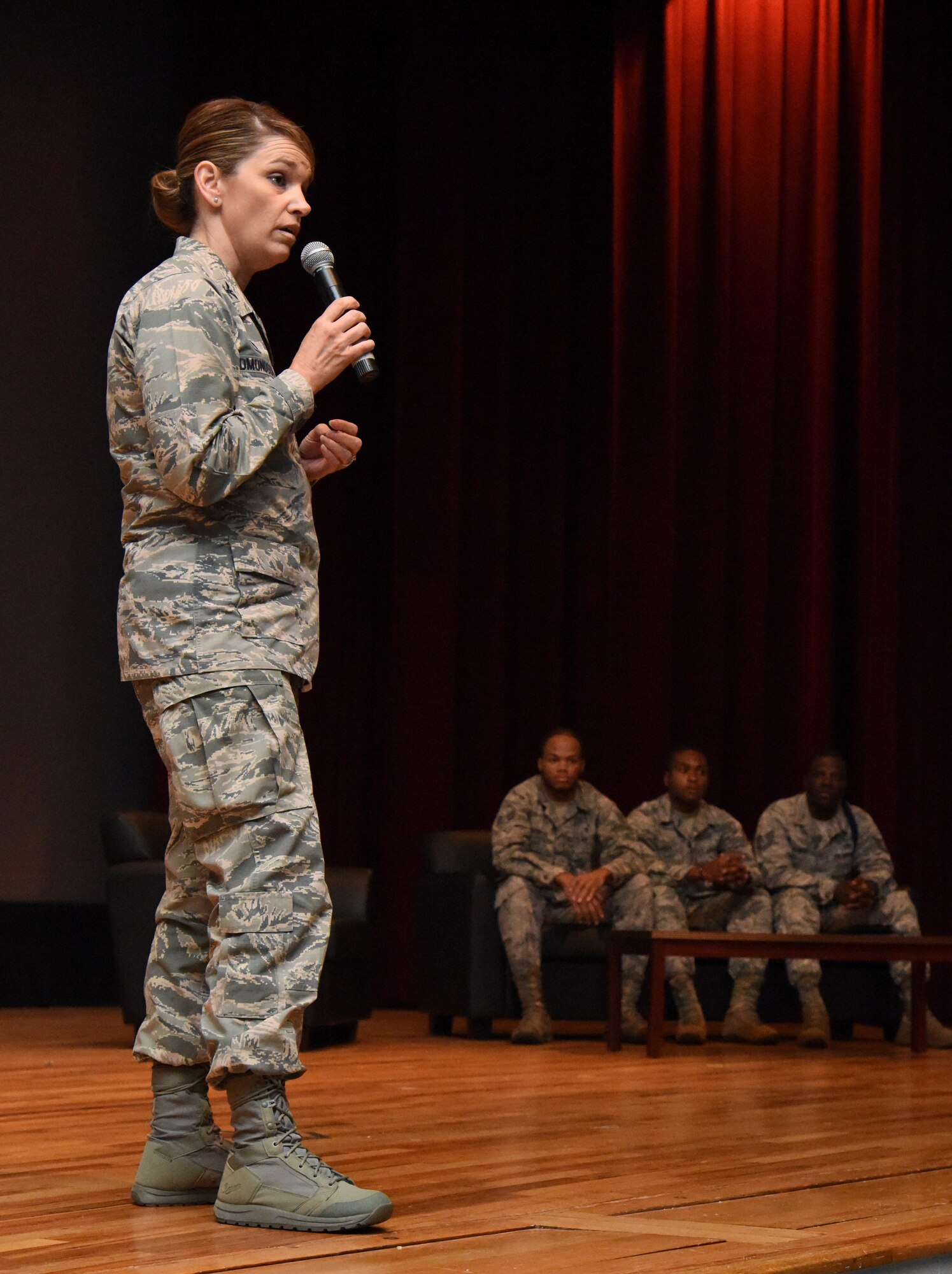 Col. Michele Edmondson, 81st Training Wing commander, delivers remarks during a storytellers event at the Welch Theater Nov. 16, 2016, on Keesler Air Force Base, Miss. The event, consisting of three speakers who shared their stories about resiliency, was one of several events held throughout Dragon Week, which focuses on resiliency and teambuilding initiatives across the base. (U.S. Air Force photo by Kemberly Groue/Released)