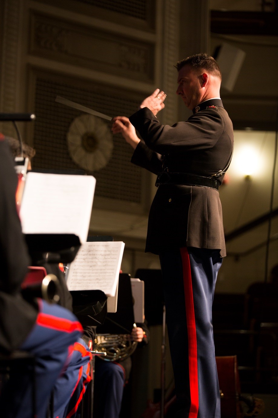 Chief Warrant Officer 3 Michael J. Smith, band officer of Marine Corps Band New Orleans, conducts the band during a concert for local residents to celebrate the Marine Corps Reserve Centennial at Plymouth Memorial Hall, Nov. 11, 2016. Marine Forces Reserve is commemorating 100 years of rich history, heritage and espirit de corps across the U.S. This concert was part of a series of events to recognize the long standing bond between Massachusetts and the Marine Corps Reserve. (U.S. Marine Corps photo by Cpl. Melissa Martens/ Released)