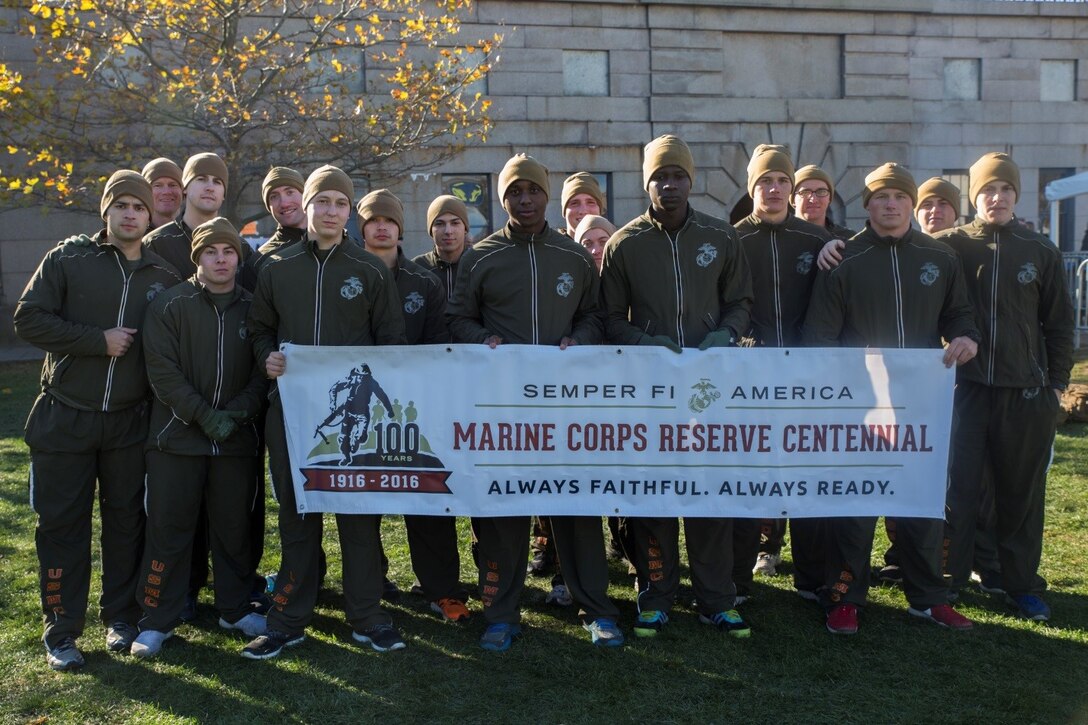 Marines from 1st Battalion, 25th Marine Regiment, 4th Marine Division, hold the Marine Forces Reserve Centennial banner after the Disabled American Veterans 5K run at Fort Independence on Castle Island in Boston, Nov. 12, 2016. From World War I through the wars in Iraq and Afghanistan, the Marine Corps Reserve has played an essential role in the Marine Corps Total Force by augmenting and reinforcing the Active Component across the full range of military operations. Reserve Marines bring unique skills and advanced degrees from their civilian occupations into their service with the Marine Corps. (U.S. Marine Corps photo by Cpl. Melissa Martens/ Released) 