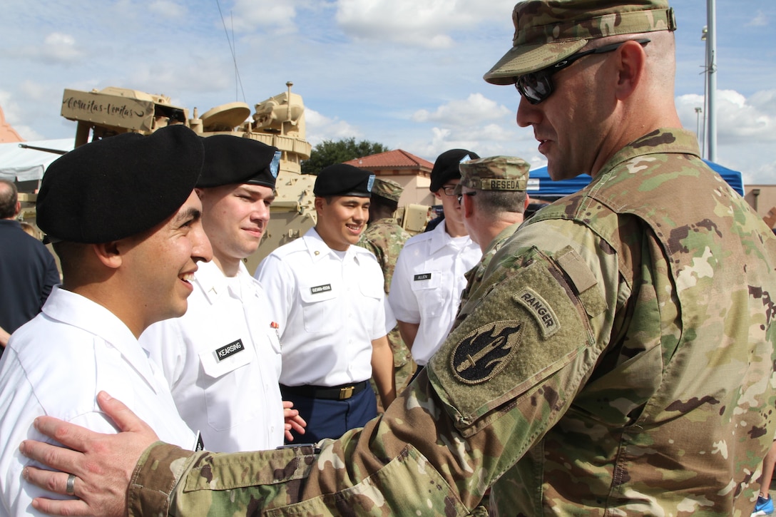 SAN ANTONIO- U.S. Army Reserve Maj. Vance Trenkel, 205th Press Camp Headquarters, shares his experiences as a combat medic with medical Soldiers training at Fort Sam Houston, during the ‘Army vs. Irish’ football game held at the Alamodome November 12, 2016. Every year since 1970 the city has come together for events like the football game during the Celebrate America’s Military celebration. 
(Photo by Army Reserve Sgt. Zechariah Gerhard, 345th Public Affairs Detachment)