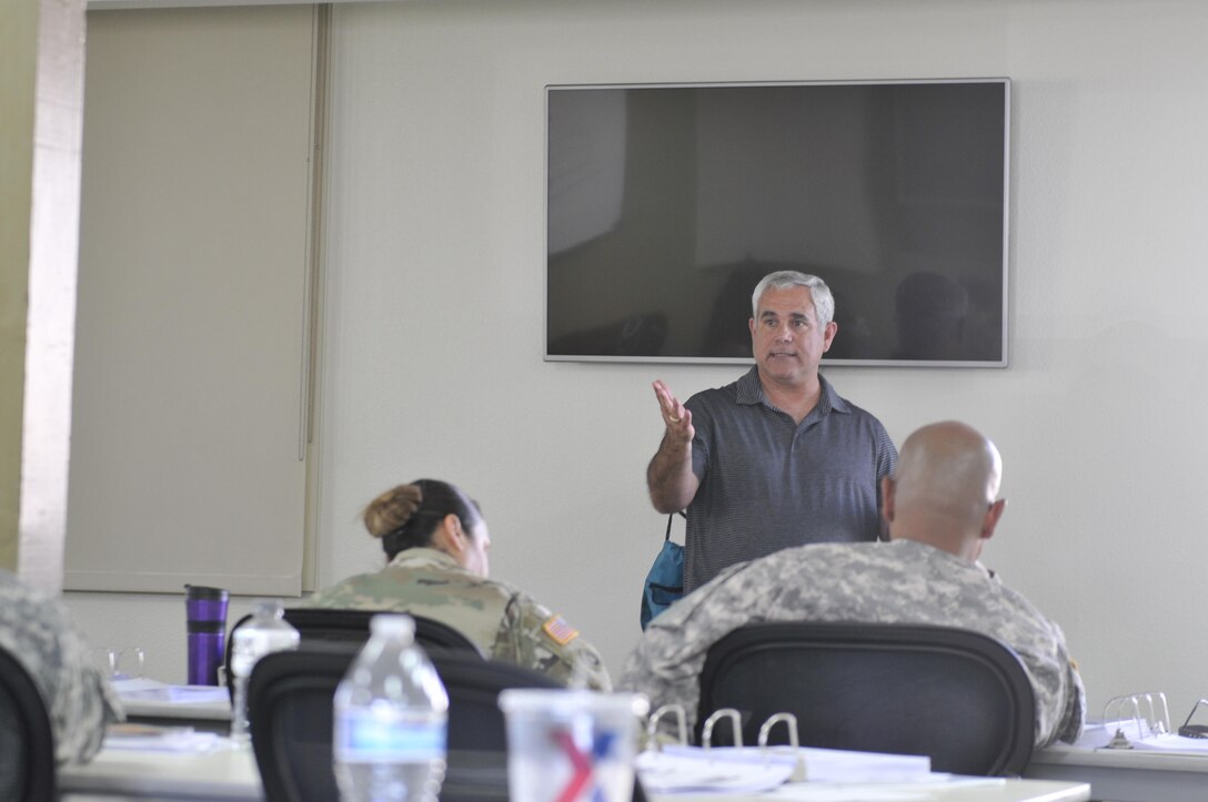 Frank Thrower, Deputy Chief of Police, Camp Parks Police Department, explains how the police initiate reports before submitting to the Criminal Investigative Division for processing, Nov. 9, Camp Parks, Dublin, Calif. Thrower discussed how to utilize safe kits and gathering evidence from victims when assaulted. His presentation was part of a 10-day certification course for 35 Sexual Harassment/Assault Response and Prevention coordinators assigned to the command and subordinate units, Oct. 31 - Nov. 10. (U.S. Army Reserve photo by Sgt. 1st Class LaTonya Kelly)