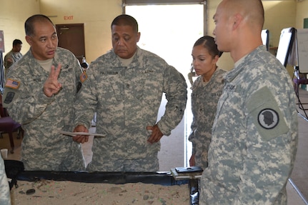 Sgt. 1st Class Matthew Mitsui, an instructor for the 4960th Multi-Functional Training Brigade pilot Army Medical Department Advanced Leader Course Phase II, explains a training exercise to students. The course was held at Fort Shafter Flats, Hawaii, October 30 - November 12, 2016.