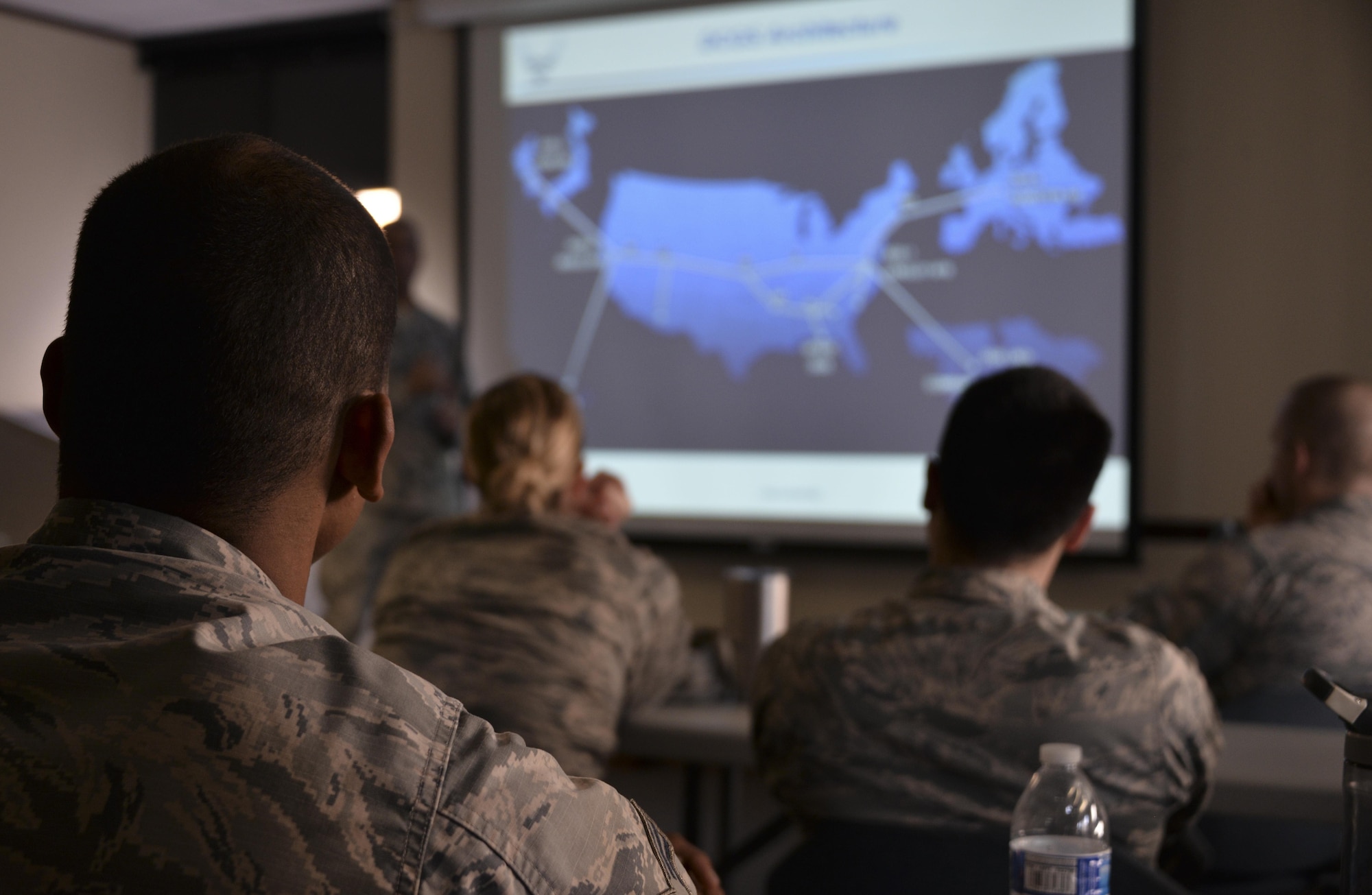 Airmen from the 70th Intelligence, Surveillance and Reconnaissance Wing are shown their area of responsibilities around the world during National Tactical Integration training November 4, 2016 at Fort Meade, Md. AF NTI works as an enterprise that collaborates to enhance Air Component operations around the world, as well as leveraging critical nation Intelligence Community information and capabilities. (U.S. Air Force photo/Staff Sgt. Alexandre Montes)